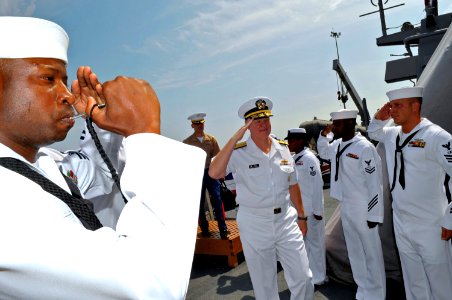 US Navy 090724-N-8273J-201 Chief of Naval Operations (CNO) Adm. Gary Roughead is piped aboard the guided-missile destroyer USS Barry (DDG 52)