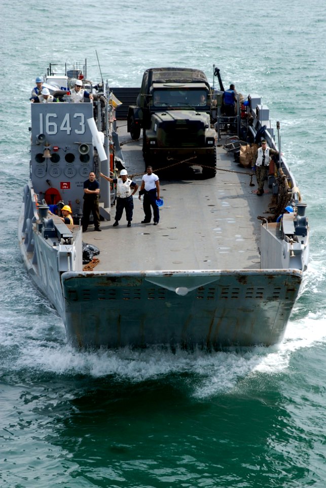 US Navy 090728-N-0924R-023 Landing Craft Unit (LCU) 1643, assigned to Assault Craft Unit (ACU) 2 based in Little Creek, Va., transport an M149 water buffalo trailer back to the amphibious dock landing ship USS Oak Hill (LSD 51)