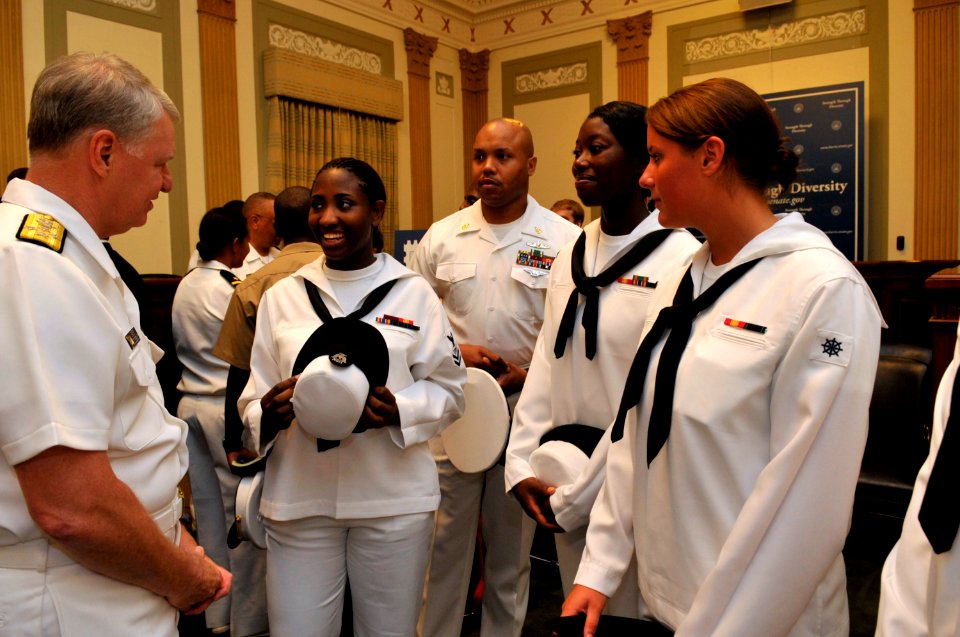 US Navy 090727-N-8273J-102 Chief of Naval Operations (CNO) Adm. Gary Roughead speaks with crew members of pre-commissioning unit Gravely (DDG 107) at the conclusion of a ceremony honoring the service of Vice Adm. Gravely