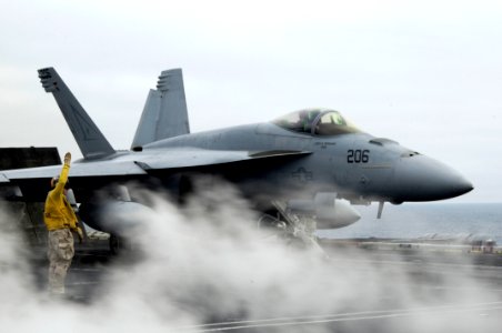 US Navy 090727-N-3038W-271 An F-A-18E Super Hornet assigned to Tophatters of Strike Fighter Squadron (VFA) 14 prepares to launch from the aircraft carrier USS Nimitz (CVN 68)