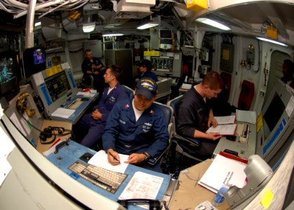 US Navy 090726-N-5148B-067 Sailors stand watch in the casualty control station aboard the amphibious dock landing ship USS Rushmore (LSD 47)