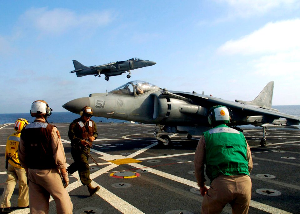 US Navy 090726-N-3925A-010 Sailors aboard the amphibious transport dock ship USS Cleveland (LPD 7) conduct flight operations with AV-8-B Harrier aircraft assigned to the Sea Elks of Marine Medium Helicopter Squadron (HMM) 166