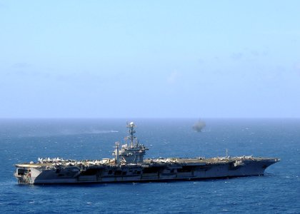 US Navy 090729-N-1062H-205 Sailors aboard the aircraft carrier USS George Washington (CVN 73) observe an explosion during a missile exercise conducted by Carrier Air Wing (CVW) 5