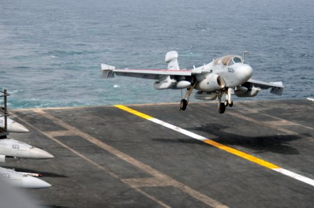 US Navy 090801-N-4995K-049 An EA-6B Prowler, assigned to the Cougars of Tactical Electronic Warfare Squadron (VAQ) 139, lands on the flight deck of the aircraft carrier USS Ronald Reagan (CVN 76)