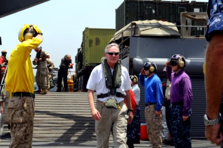 US Navy 090803-N-1831S-156 ecretary of the Navy (SECNAV) the Honorable Ray Mabus walks through Navy and Marine Corps sideboys after his arrival aboard the amphibious dock landing ship USS Fort McHenry (LSD 43)