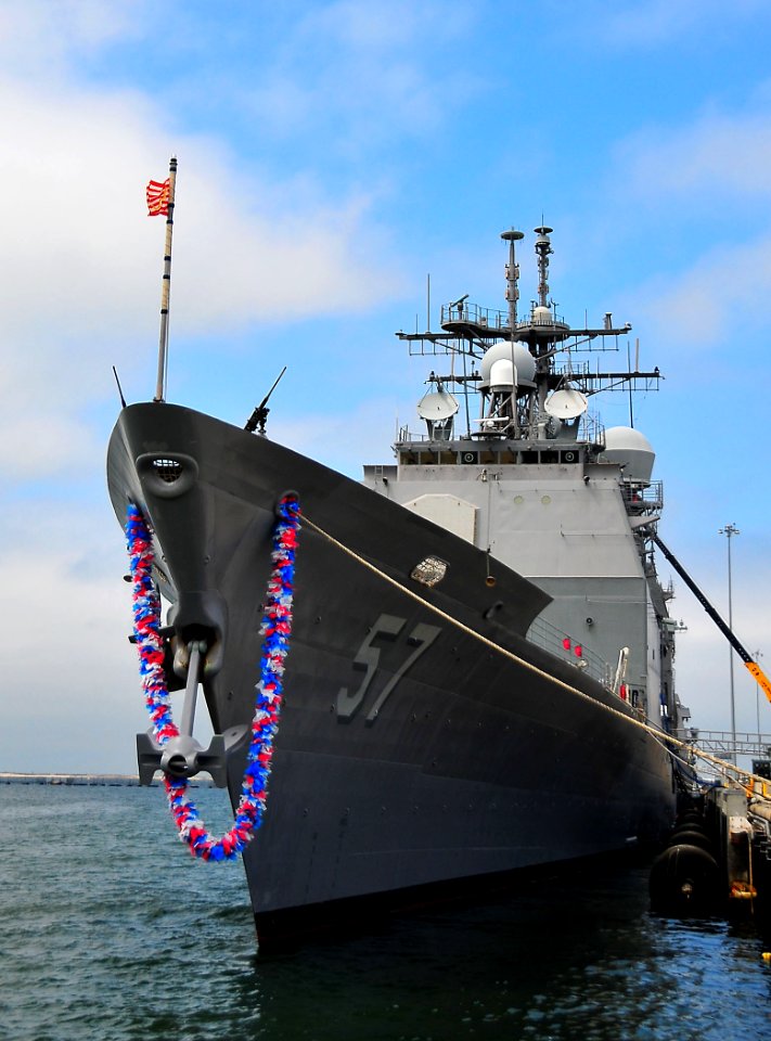 US Navy 090730-N-4774B-094 he guided-missile cruiser USS Lake Champlain (CG 57) is adorned with a lei during a homecoming celebration