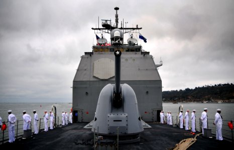 US Navy 090730-N-4774B-024 Sailors aboard the guided-missile cruiser USS Lake Champlain (CG 57) man the rails as the ship passes Point Loma transiting San Diego harbor