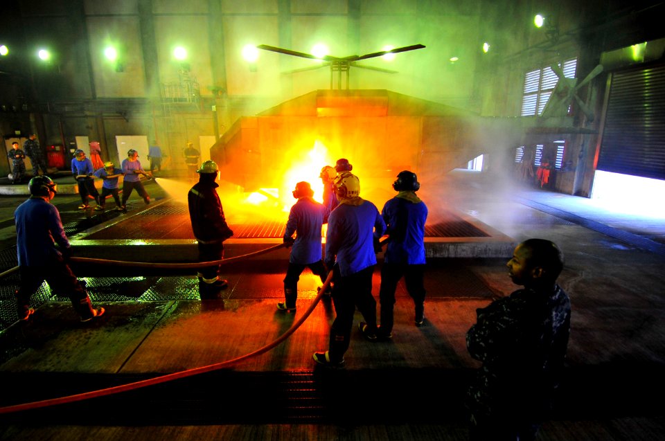 USS Blue Ridge sailors participate in flight deck firefighting training 140131-N-QL961-014