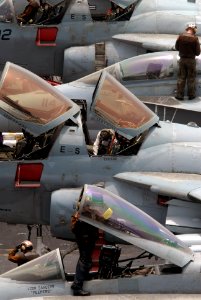 US Navy 090801-N-9132C-112 Plane captains assigned to Carrier Air Wing (CVW) 14 clean their aircraft on the flight deck of the aircraft carrier USS Ronald Reagan (CVN 76)