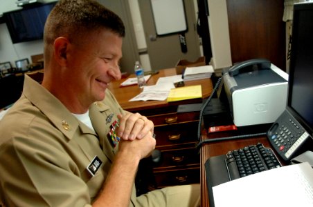 US Navy 090805-N-9818V-038 Master Chief Petty Officer of the Navy (MCPON) Rick West answers questions during a telephone interview photo