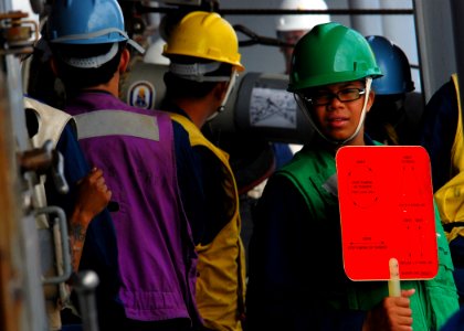 US Navy 090802-N-5207L-185 Sailors assigned to the amphibious dock landing ship USS Harpers Ferry (LSD 49) supervise the transfer of fuel from the Military Sealift Command fleet replenishment oiler USNS Rappahannock (T-AO 204)