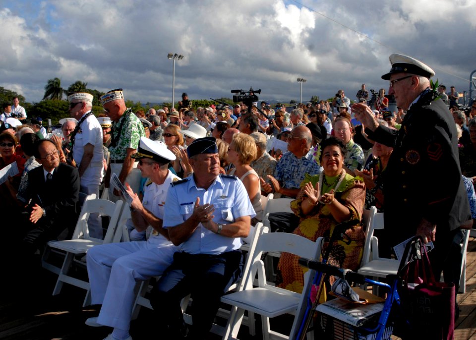 US Navy 090802-N-8539M-567 World War II veterans are applauded during the 64th anniversary of the end of World War II ceremony aboard the battleship USS Missouri Memorial