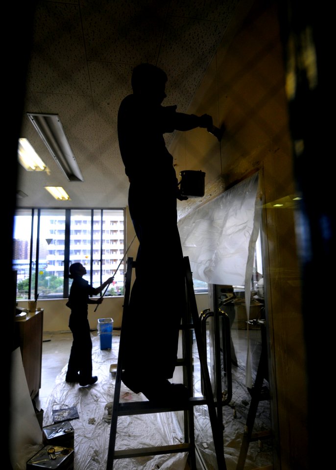 US Navy 090804-N-7280V-400 Sailors assigned to the amphibious command ship USS Blue Ridge (LCC 19) and embarked Seventh Fleet staff Sailors paint a classroom in the Tokyo YMCA International School during a community service pro