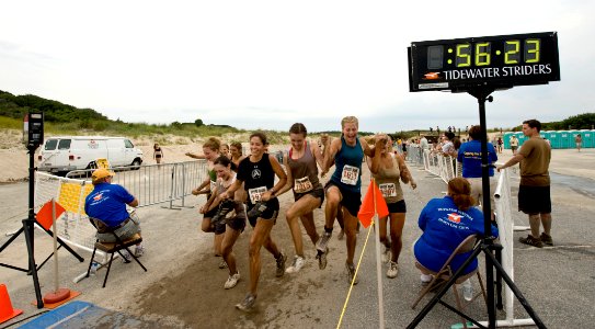 US Navy 090808-N-7874H-256 Runners struggle through mud during the Naval Amphibious Base Little Creeks 9th annual Mud Run