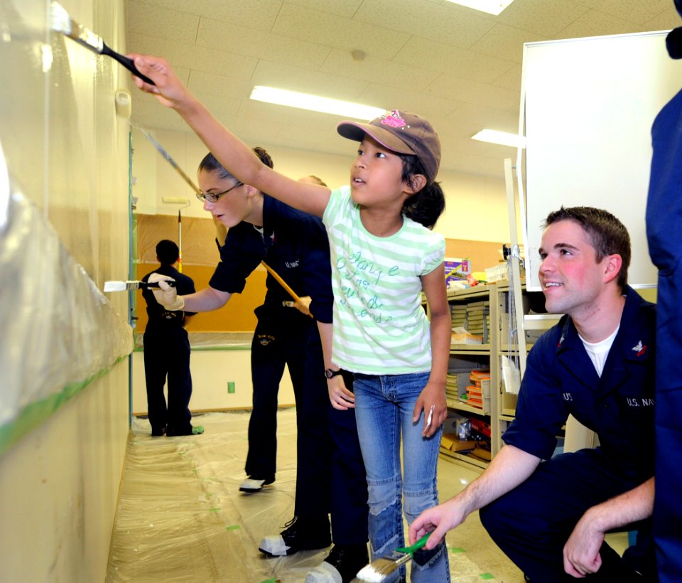 US Navy 090804-N-7280V-398 Sailors paint a classroom during a community service project