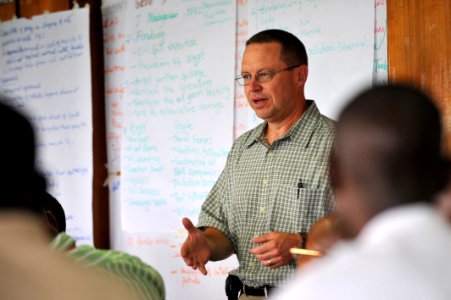 US Navy 090806-N-2420K-006 U.S. Navy Capt. Jeffery Landsman, a professor with the U.S. Naval War College, discusses an oil spill scenario with students at the Maritime Center of Excellence (MCE) course at Bandari College