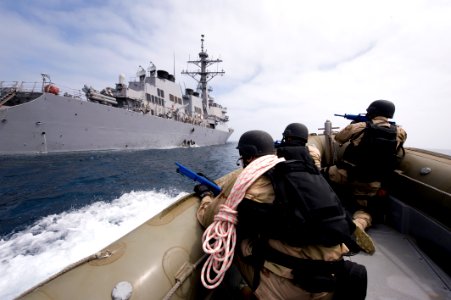 US Navy 090805-N-0413R-001 Members of the visit, board, search and seizure team assigned to the guided-missile destroyer USS Curtis Wilbur (DDG 54), photo