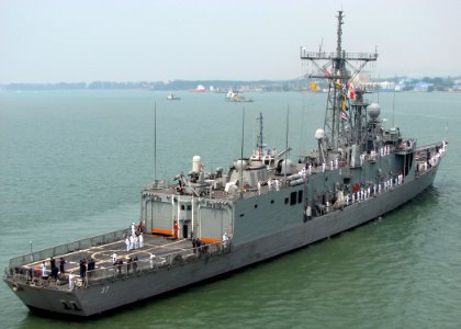 US Navy 090803-N-7058E-003 Sailors man the rails aboard the guided-missile frigate USS Crommelin (FFG 37) during the ship's arrival at Muara Naval Base for Cooperation Afloat Readiness and Training (CARAT) Brunei 2009 photo