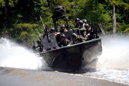 US Navy 090805-N-4205W-142 Romanian Chief of Staff Adm. Gheorge Marin and members of his staff ride in a special operations craft-riverine during a visit to the Naval Small Craft Instruction and Technical Training School