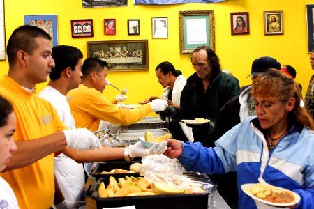 US Navy 090806-N-3038C-021 Sailors and Delayed Entry Program recruits from Navy Recruiting Station Salinas serve breakfast to the needy at Dorothy's Place in Salinas, Calif photo