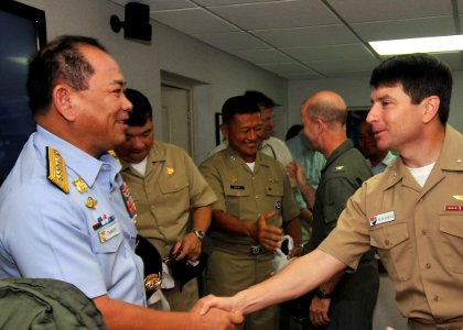 US Navy 090810-N-6233H-002 Rear Adm. Kevin Donegan, right, commander of Battle Force 7th Fleet, greets Adm. Wilfredo D. Tamayo, commandant of the Republic of the Philippines Coast Guard