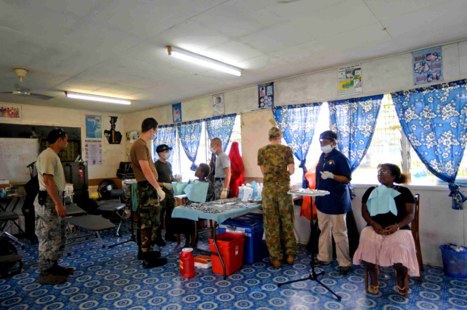 US Navy 090811-N-9689V-008 Pacific Partnership 2009 team members from the U.S., Australia and Canada provide dental treatment to patients