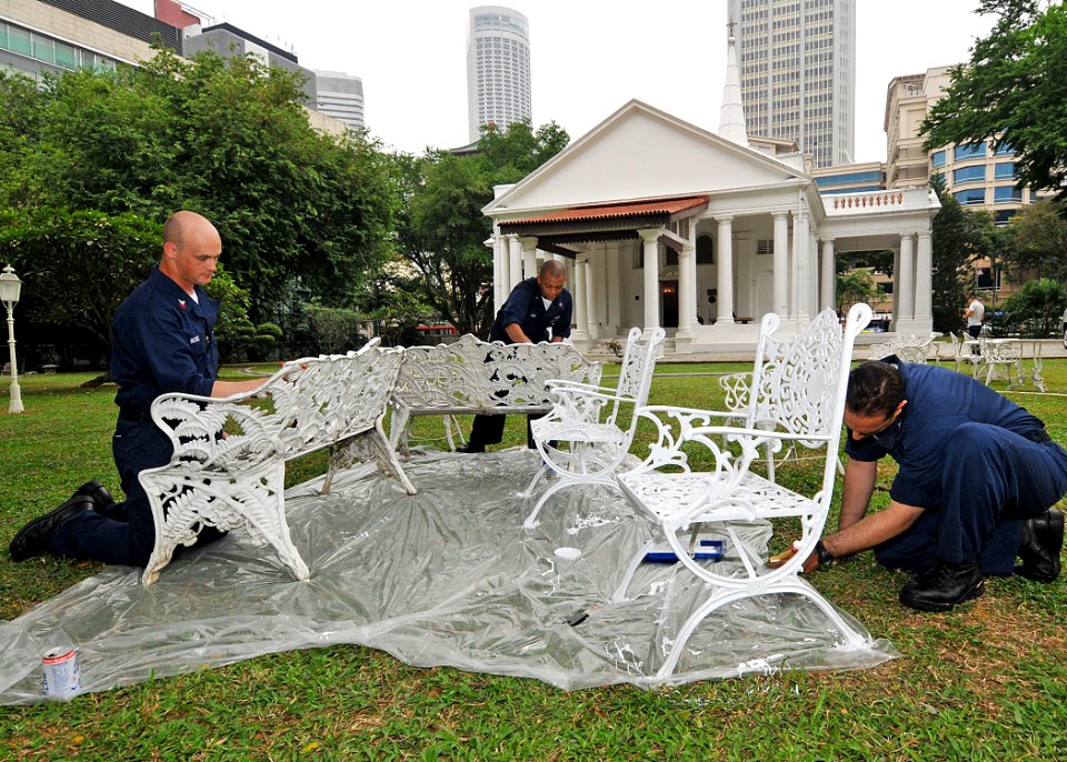 US Navy 090805-N-6233H-068 ailors assigned to the aircraft carrier USS George Washington (CVN 73) paint benches and chairs during a community service project at the Armenian Church in Singapore