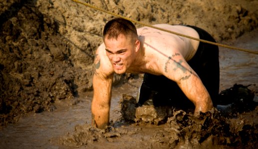 US Navy 090808-N-7874H-115 Runners struggle through the mud during the Naval Amphibious Base Little Creeks 9th annual Mud Run