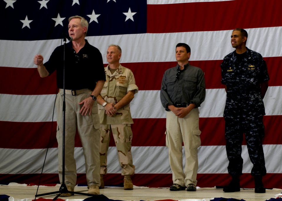 US Navy 090807-N-8655E-074 Secretary of the Navy (SECNAV) Ray Mabus, front, accompanied by Capt. Jack Sotherland, commander of the Bataan Amphibious Ready Group (ARG)