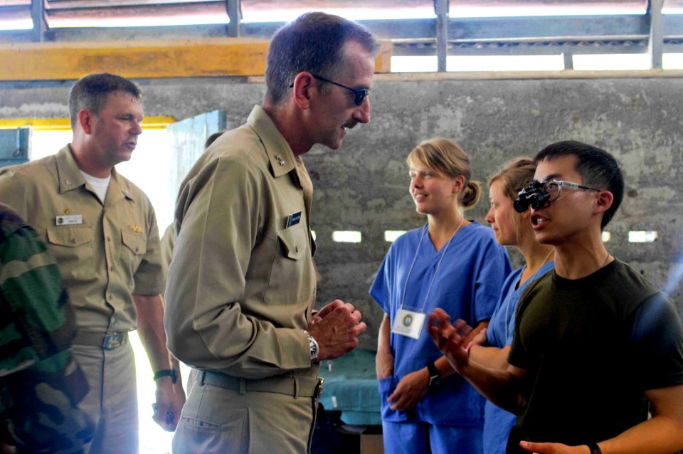 US Navy 090808-N-9689V-007 U.S. Navy Rear Adm. Robin M. Watters, left, reserve deputy and Chief of Staff, U.S. Pacific Fleet, greets Canadian dentist Army Capt. Jason Yee during a Pacific Partnership 2009 medical civic action p