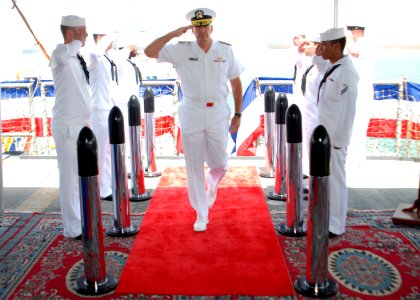 US Navy 090813-N-0803S-010 U.S. Navy Rear Adm. Scott Sanders salutes the side boys as he arrives to relieve Turkish Navy Rear Adm. Caner Bener as commander of Combined Task Force (CTF) 151 during a change of command ceremony photo