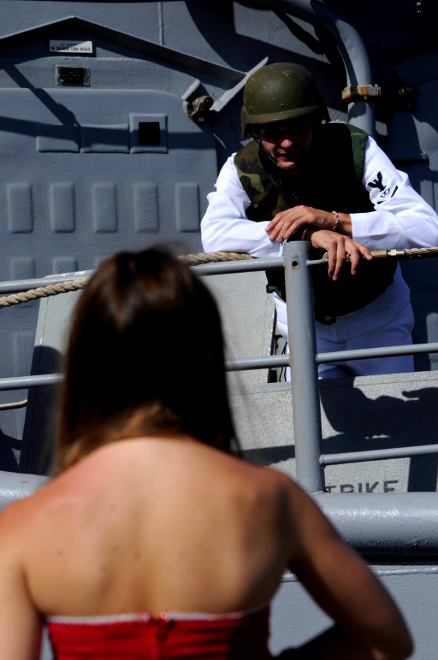 US Navy 090807-N-7498L-324 Fire Controlman 3rd Class Garrett Jones says good-bye to his wife at the pier as the Ticonderoga-class guided-missile cruiser USS Chosin (CG 65)