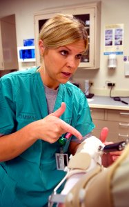 US Navy 090813-N-7090S-075 Army Capt. Michelle Greer, chief of occupational therapy at Brooke Army Medical Center in San Antonio, Texas,