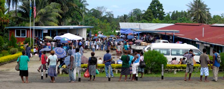 US Navy 090813-N-9689V-006 Civilians gather to receive treatment during a Pacific Partnership 2009 medical civic action project at Kilu'ufi Hospital in Auki, Solomon Islands