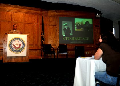 US Navy 090815-N-4236E-027 Fleet Master Chief Tom Howard speaks to the spouses of chief petty officer (CPO) selectees during the 2nd annual CPO Selectees Spouse Workshop photo