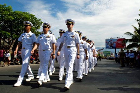 US Navy 090818-N-9123L-113 Sailors assigned to the guided-missile destroyer USS McCampbell (DDG 85) march and wave to the crowd in an international parade