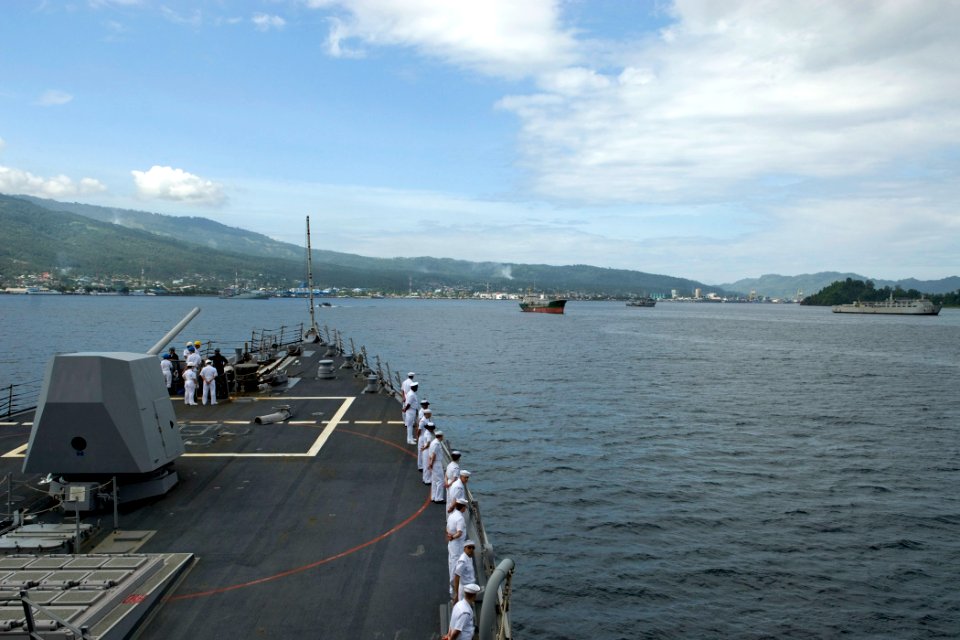 US Navy 090815-N-9123L-084 Sailors aboard the guided-missile destroyer USS McCampbell (DDG 85) man the rails as the ship prepares to anchor off the coast of Bitung, Indonesia