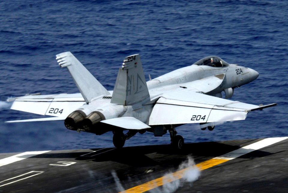 US Navy 090814-N-3038W-035 An FA-18E Super Hornet assigned to the Tophatters of Strike Fighter Squadron (VFA) 14 launches from the aircraft carrier USS Nimitz (CVN 68)