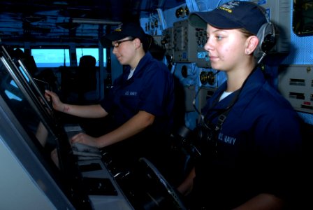 US Navy 090819-N-2600H-006 Boatswain's Mate Seaman Ashley Hulcy and Seaman Juliana Bendishaw stand watch in the bridge of the aircraft carrier USS Nimitz (CVN 68)