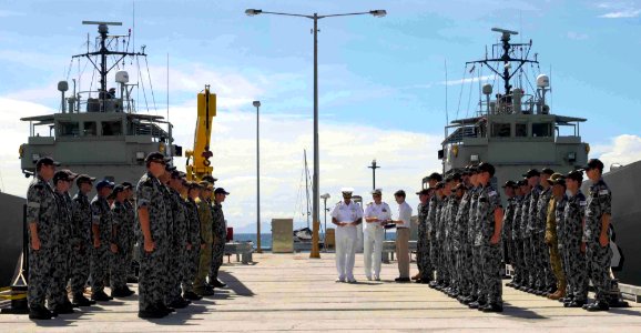 US Navy 090818-N-9689V-002 Capt. Andrew Cully, Pacific Partnership 2009 mission commander, thanks the crews of Royal Australian Navy Landing Craft Heavy (LCH) HMAS Betano (L 133) and HMAS Wewak (L 130) for their contributions t photo