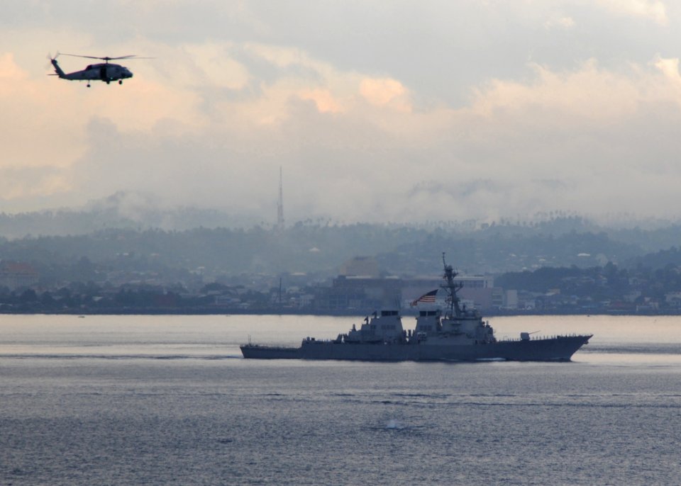 US Navy 090819-N-1644H-400 The guided missle destroyer USS Fitzgerald (DDG 62) is underway in formation behind the aircraft carrier USS George Washington (CVN 73) during the Indonesian International Fleet Review