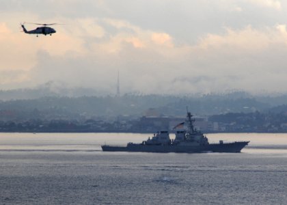 US Navy 090819-N-1644H-400 The guided missle destroyer USS Fitzgerald (DDG 62) is underway in formation behind the aircraft carrier USS George Washington (CVN 73) during the Indonesian International Fleet Review