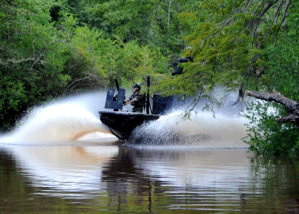 US Navy 090816-N-4205W-017 Special warfare combatant-craft crewmen (SWCC) from Special Boat Team (SBT) 22 operate a special operations craft-riverine during the filming of a scene in a upcoming major motion picture