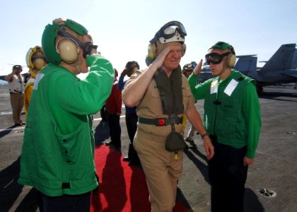 US Navy 090819-N-7282P-016 Chief of Naval Operations (CNO) Adm. Gary Roughead is rendered honors by rainbow side boys on the flight deck of the aircraft carrier USS George Washington (CVN 73)
