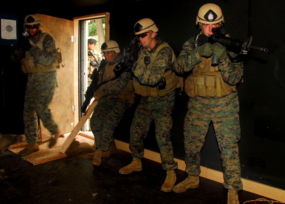US Navy 090820-N-9573A-006 Marines from Fleet Anti-terrorism Security Team, Company Pacific (FASTPAC) secure a space during a simulated hostage scenario at Commander, Fleet Activities Chinhae