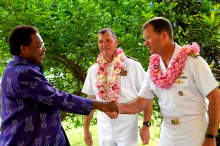 US Navy 090818-N-9689V-003 Prime Minister Dr. Derek Sikua, greets Capt. Andrew Cully, Pacific Partnership mission commander, during the closing ceremony of the Pacific Partnership mission in the Solomon Islands