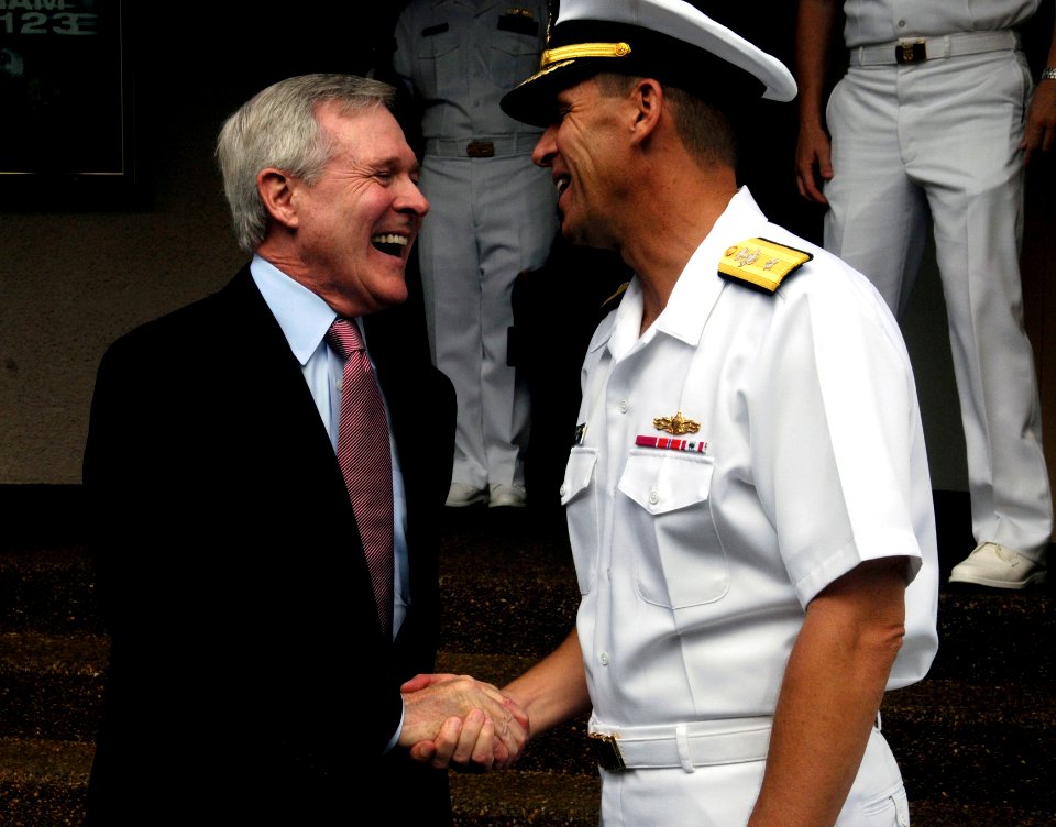 US Navy 090820-N-7498L-069 Secretary of the Navy (SECNAV) the Honorable Ray Mabus and Rear Adm. Dixon Smith, commander, Navy Region Hawaii, share a laugh after answering questions during an all-hands call at Naval Station Pearl