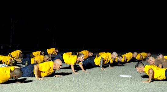 US Navy 090821-N-6889J-015 Chief selects from Naval Construction Battalion Center (NCBC) Gulfport conduct early morning physical training with chief petty officers