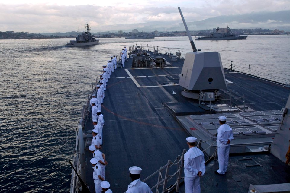 US Navy 090819-N-9123L-065 Sailors aboard guided-missile destroyer USS McCampbell (DDG 85) man the rails as the ship moves in formation in the Indonesian International Fleet Review off the coast of Manado, Indonesia