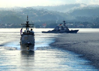 US Navy 090819-N-1644H-414 The guided-missile cruiser USS Cowpens (CG 63) and the guided-missile destroyer USS Fitzgerald (DDG 62) are underway in formation during the Indonesian International Fleet Review